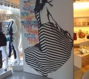 Customized walls make a big impact to this interior retail space, at Intermix, NY.