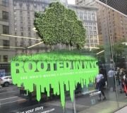 Window clings are enhanced by use of custom fabricated dimensional tree