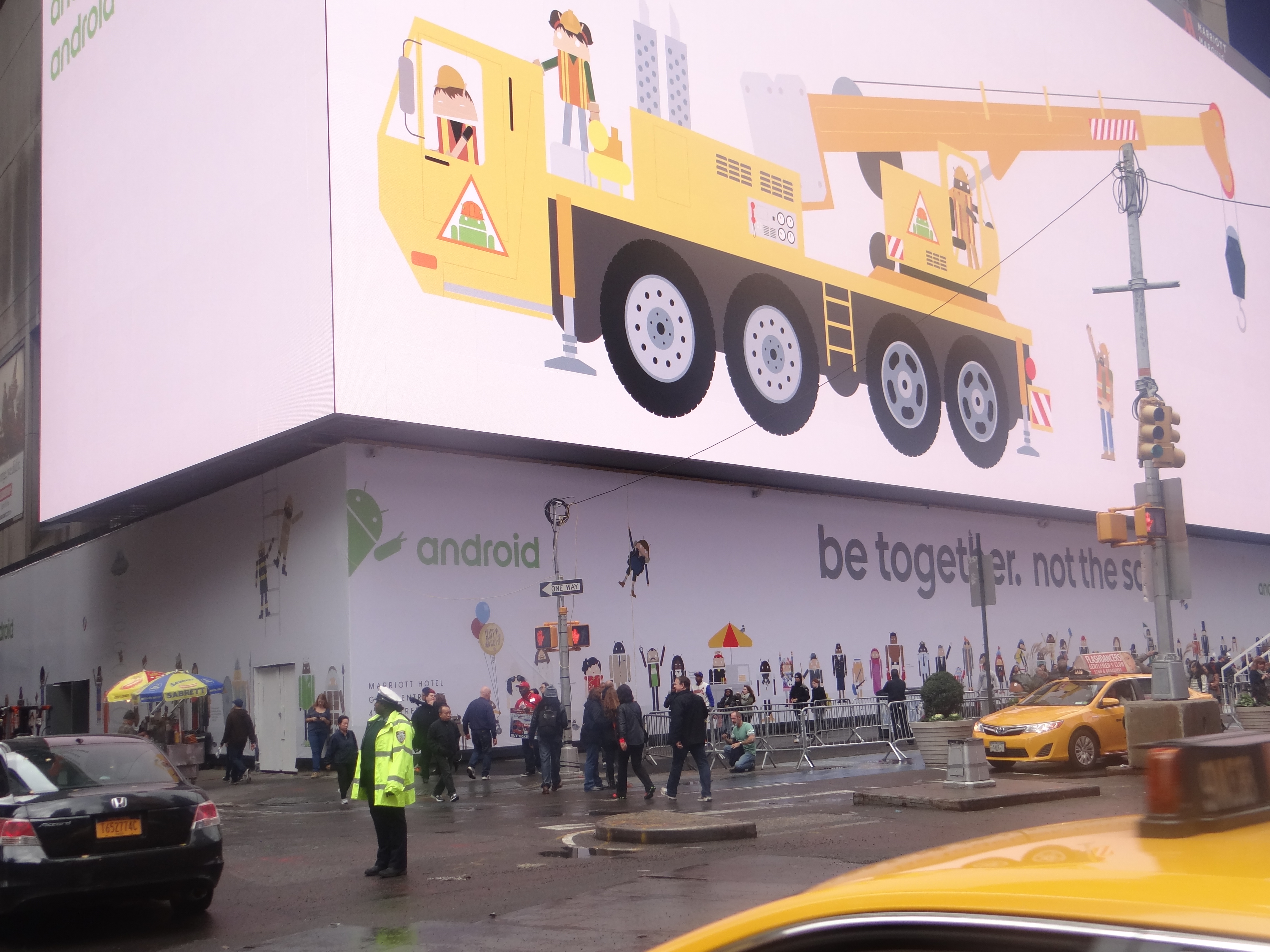 Barricade vinyl graphics under the worlds largest video screen in Times Square NYC