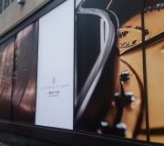 For new store opening large printed vinyls add privacy to the inside under construction and advertising the new opening on the outside .