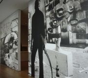 At this exhibition in MoMA, large black and white photos are digitally printed for wall murals.