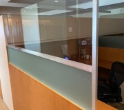 Half inch polished plexiglass divider added to existing partition