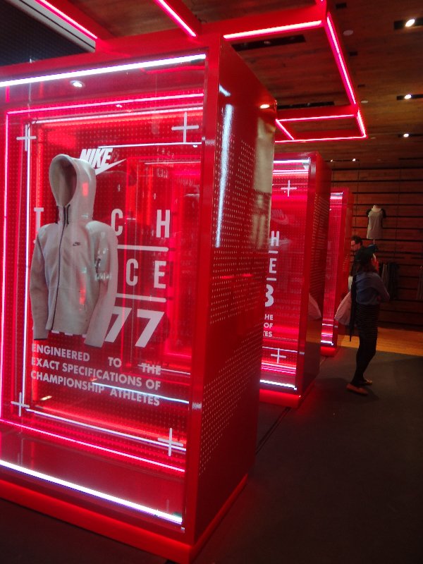acrylic display uses multiple print techniques to achieve translucent red details of cross hairs and clean white sharp text.