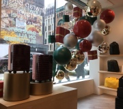 Holidays windows rollout for national retailer. Custom fabricated and paint finishes for oversized ornaments.