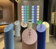 Custom fabricated and painted pedestals are created to hold luxury products  as well as back wall LED lit display