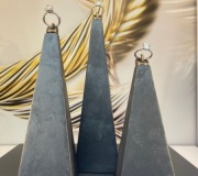 custom merchandise fixtures fabricated with Venetian plaster finish + layered laser cut photo prints to create 3D effect