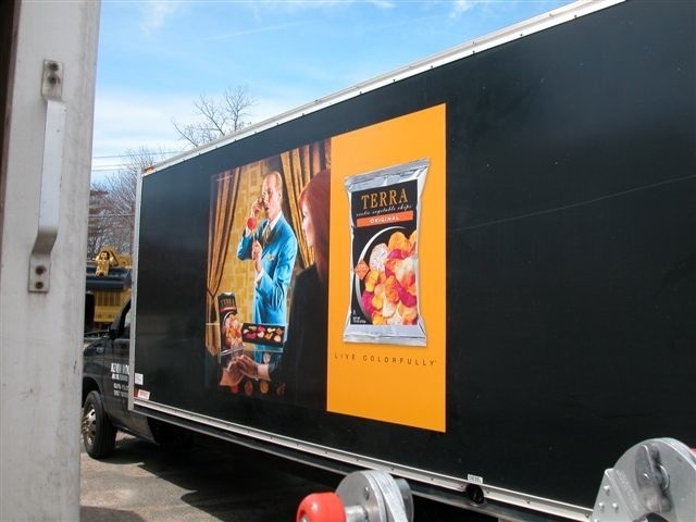 Graphics on side of trailers or trucks acts as moving billboard