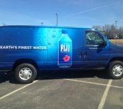 Color X prints and installs fleet trucks , vans , and car wraps nationwide